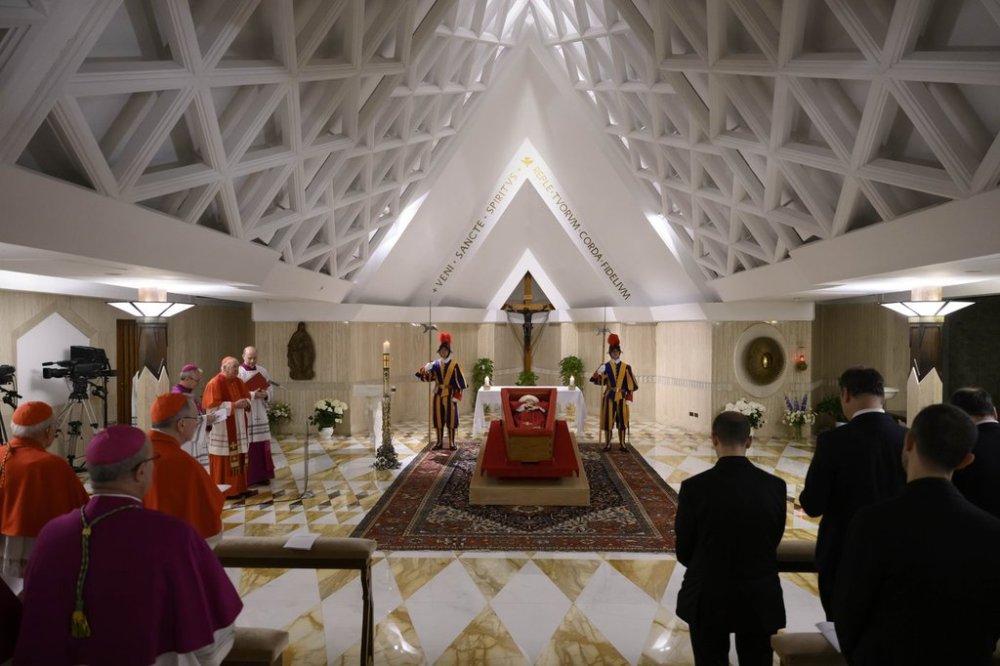 Pope Francis's body is laid out in state inside his private chapel at the Vatican, Monday, April 21, 2025. From left, Dean Cardinal Giovanni Battista Re, unidentified bishop, Secretary of State Pietro Parolin, Master of Ceremonies Archbishop Diego Giovanni Ravelli, Cardinal Camerlengo Kevin Joseph Farrell, and Master of Ceremonies Lubomir Welnitz. (Vatican Media via AP, HO)
