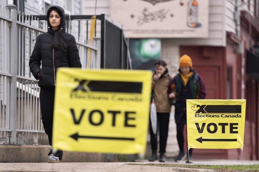Elections Canada signage is seen as voters arrive at a polling station on Election Day in Halifax on Monday, April 28, 2025. The polls have closed across Atlantic Canada, where Liberal candidates are hoping their party's lead in the latest national polls will be reflected in the ballot boxes. THE CANADIAN PRESS/Darren Calabrese