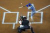 Los Angeles Dodgers' Tommy Edman (25) connects for a leadoff home run on the second pitch of the game by Texas Rangers starting pitcher Jacob deGrom during the first inning of a baseball game Friday, April 18, 2025, in Arlington, Texas. (AP Photo/Julio Cortez)