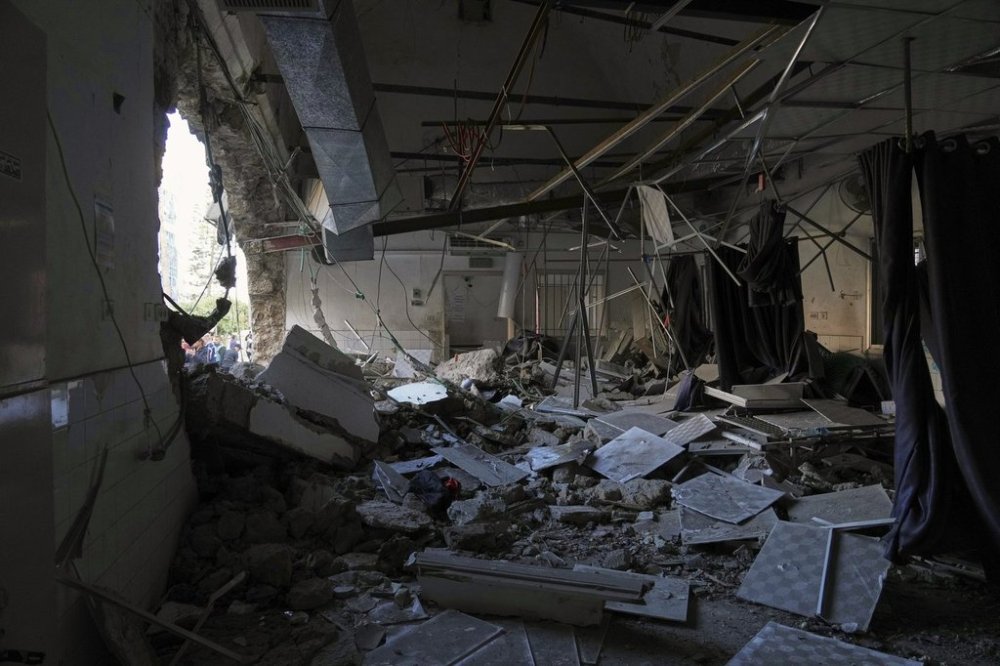 The outpatient and laboratory wards of the Al-Ahli Arab Baptist hospital are seen after being hit by an Israeli army strike late Saturday, following a warning issued by the army to evacuate patients, in Gaza City, Sunday, April 13, 2025. (AP Photo/Jehad Alshrafi)