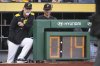Pittsburgh Pirates manager Derek Shelton, left, and bench coach Don Kelly stand in the dugout during a baseball game against the Chicago Cubs in Pittsburgh, Wednesday, April 30, 2025. (AP Photo/Gene J. Puskar)