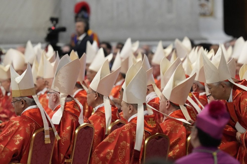Cardinals attend a final Mass St. Peter's Basilica, before the conclave to elect a new pope, at the Vatican, Wednesday, May 7, 2025. (AP Photo/Gregorio Borgia)