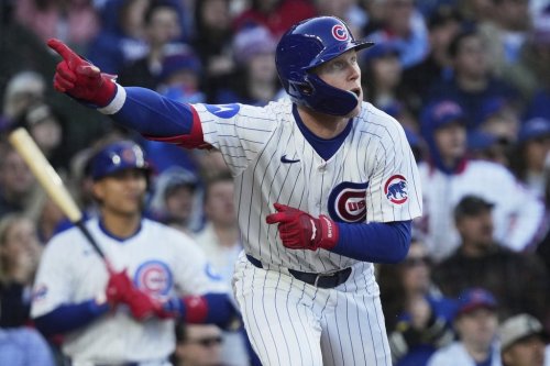 Chicago Cubs' Pete Crow-Armstrong points after hitting a one-run double during the second inning of a baseball game against the Philadelphia Phillies in Chicago, Sunday, April 27, 2025. (AP Photo/Nam Y. Huh)