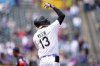 Colorado Rockies' Zac Veen gestures to the bullpen after hitting a solo home run off Washington Nationals starting pitcher Jake Irvin in the fourth inning of Game 1 of a split baseball doubleheader Sunday, April 20, 2025, in Denver. (AP Photo/David Zalubowski)
