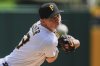 Pittsburgh Pirates pitcher Mitch Keller delivers during the first inning of a baseball game against the Cleveland Guardians in Pittsburgh, Sunday, April 20, 2025. (AP Photo/Gene J. Puskar)