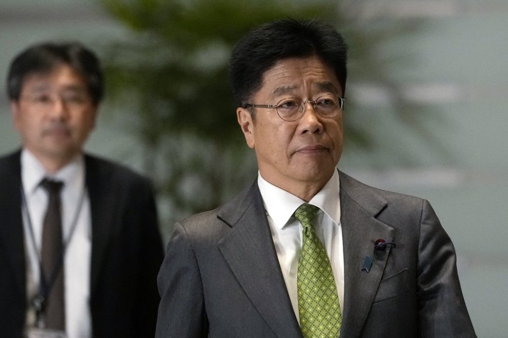 FILE - Finance Minister Katsunobu Kato arrives at the prime minister's office Monday, Nov. 11, 2024, in Tokyo. (AP Photo/Shuji Kajiyama, file)