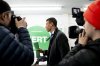 Green Party co-leader Jonathan Pedneault walks out the door after holding a press conference in Montreal,  Wednesday, April 16, 2025. THE CANADIAN PRESS/Christopher Katsarov