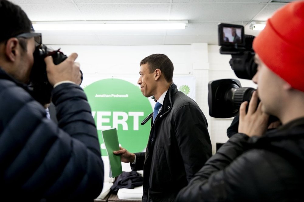 Green Party co-leader Jonathan Pedneault walks out the door after holding a press conference in Montreal, Wednesday, April 16, 2025. THE CANADIAN PRESS/Christopher Katsarov
