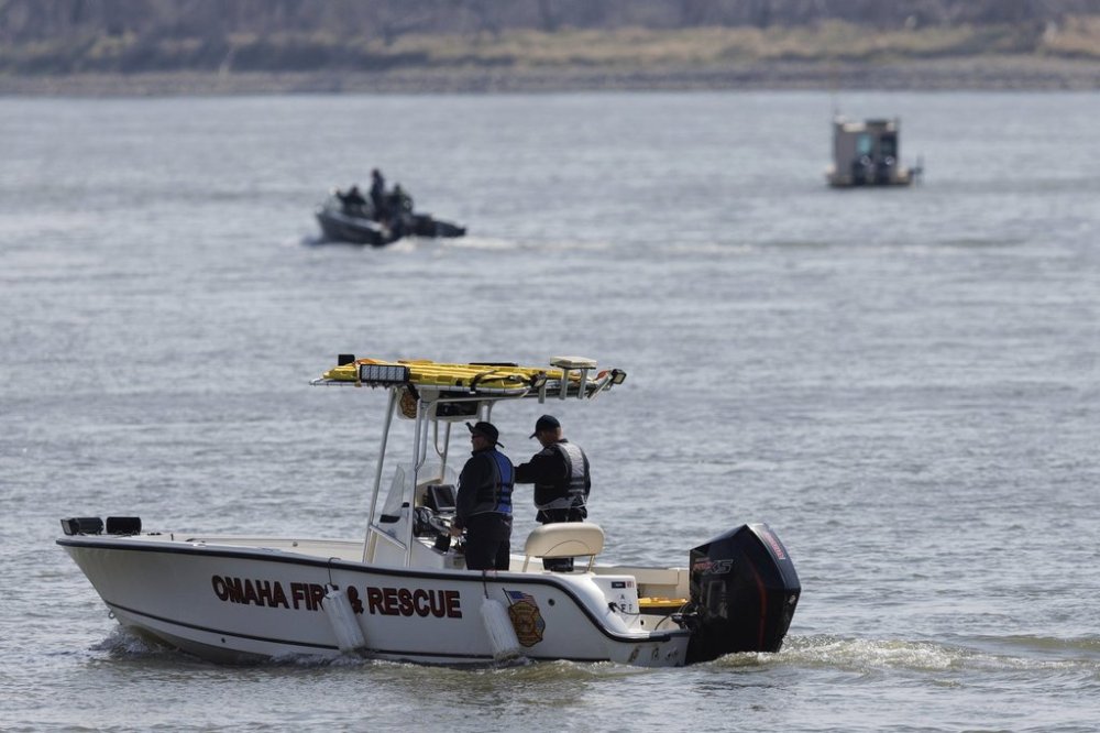 First responders search the Missouri River near N.P. Dodge Park, Wednesday, April 16, 2025, in Omaha, Neb. First responders are searching for two 18-year-olds and an 11-year-old girl missing in the Missouri River. (Nikos Frazier/Omaha World-Herald via AP)