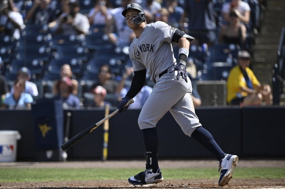 New York Yankees' Aaron Judge watches the flight of the ball as it is called foul during the eighth inning of a baseball game against the Tampa Bay Rays, Sunday, April 20, 2025, in Tampa, Fla. (AP Photo/Phelan M. Ebenhack)