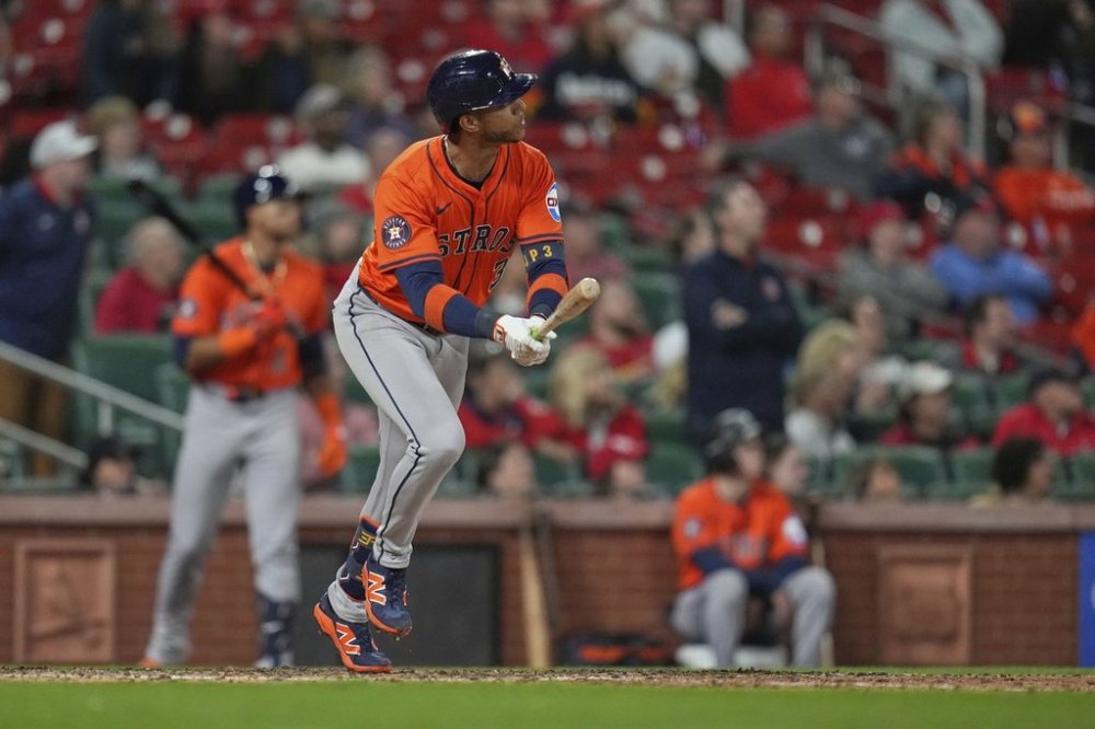 Houston Astros' Jeremy Pena watches his three-run home run during the ninth inning of a baseball game against the St. Louis Cardinals Monday, April 14, 2025, in St. Louis. (AP Photo/Jeff Roberson)