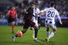 Barcelona's Lamine Yamal, left, and Leganes' Javi Hernandez challenge for the ball during the Spanish La Liga soccer match between CD Leganes and Barcelona at the Butarque stadium in Leganes, outside Madrid, Spain, Saturday, April 12, 2025. (AP Photo/Manu Fernandez)
