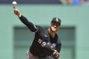 Chicago White Sox's Sean Burke delivers a pitch to a Boston Red Sox batter in the first inning of a baseball game, Sunday, April 20, 2025, in Boston. (AP Photo/Steven Senne)