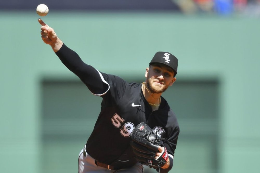 Chicago White Sox's Sean Burke delivers a pitch to a Boston Red Sox batter in the first inning of a baseball game, Sunday, April 20, 2025, in Boston. (AP Photo/Steven Senne)