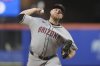 Arizona Diamondbacks' Corbin Burnes pitches during the second inning of a baseball game against the New York Mets Wednesday, April 30, 2025, in New York. (AP Photo/Frank Franklin II)