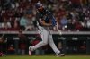Washington Nationals' Amed Rosario hits a three-run home run in the sixth inning of a baseball game against the Cincinnati Reds, Saturday, May 3, 2025, in Cincinnati. (AP Photo/Carolyn Kaster)