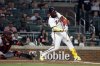 Atlanta Braves designated hitter Marcell Ozuna hits a walk off RBI during the 10th inning of a baseball game to beat the Cincinnati Reds, Tuesday, May 6, 2025, in Atlanta. (AP Photo/Butch Dill)