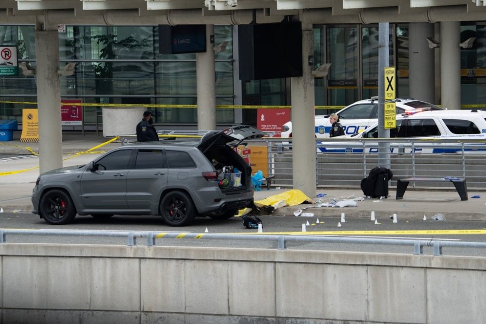 Evidence is pictured at the scene of police-involved shooting at the departures area of Toronto Pearson International Airport., in Mississauga, Ont., on Thursday, April 24, 2025. THE CANADIAN PRESS/Arlyn McAdorey
