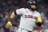 Cleveland Guardians' Carlos Santana hits a home run during the sixth inning of the second baseball game of a doubleheader against the Washington Nationals, Tuesday, May 6, 2025, in Washington. (AP Photo/Daniel Kucin Jr.)
