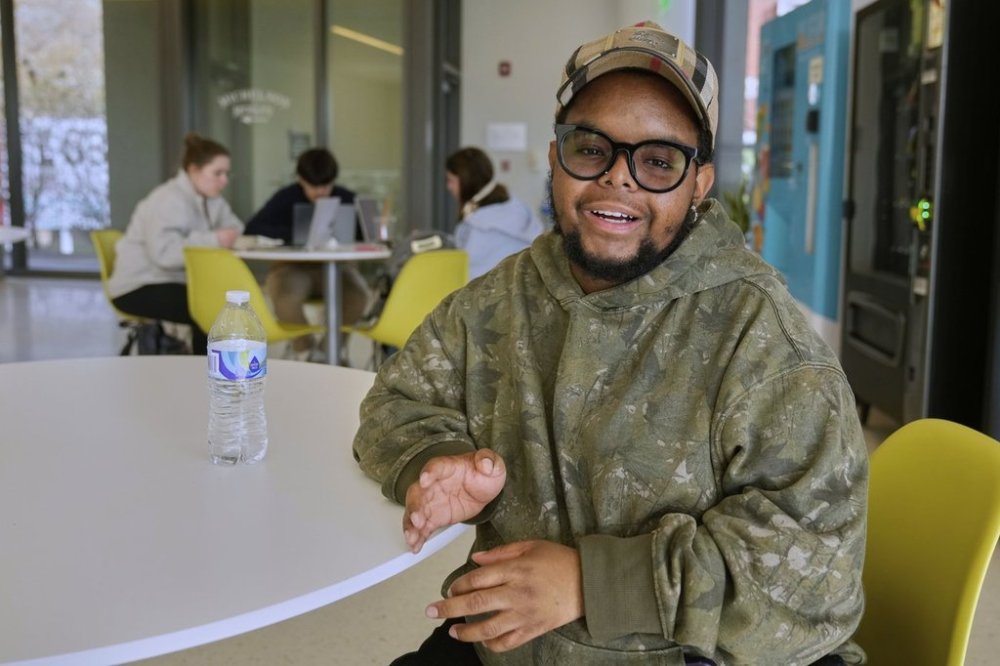 Case Western Reserve University student. Justen Pippens poses for a photo in the student union at the school In Cleveland Thursday, April 17, 2025. (AP Photo/Sue Ogrocki)