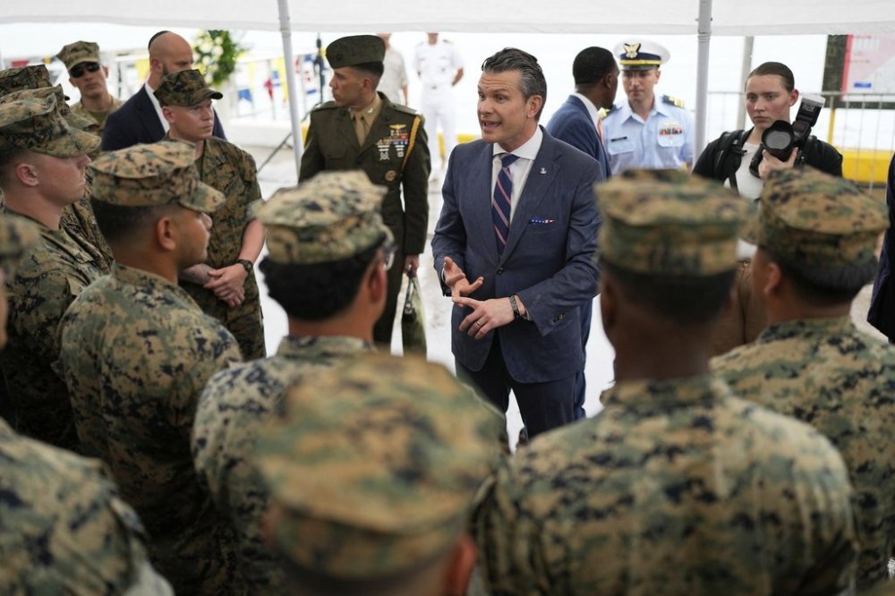 U.S. Defense Secretary Pete Hegseth speaks with U.S. troops after a joint drill with Panamanian forces at the Port of Rodman in West Panama, Tuesday, April 8, 2025. (AP Photo/Matias Delacroix)