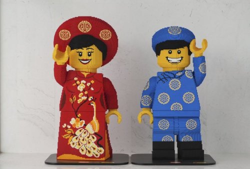 Lego characters in Vietnamese traditional costumes are displayed at Lego factory in Binh Duong, Vietnam Wednesday, April, 2, 2025. (AP Photo/Hau Dinh)