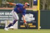 FILE - New York Mets second baseman Jeff McNeil handles a ground out by Miami Marlins' Kyle Stowers during the first inning of a spring training baseball game Wednesday, Feb. 26, 2025, in Jupiter, Fla. (AP Photo/Jeff Roberson,File)