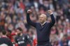 Liverpool's manager Arne Slot celebrates at the end of the English Premier League soccer match between Liverpool and West Ham United at Anfield in Liverpool, Sunday, April 13, 2025. (AP Photo/Ian Hodgson)