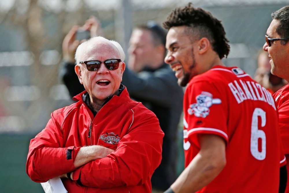 FILE - Cincinnati Reds' Billy Hamilton (9) shares a laugh with Reds executive advisor Walt Jocketty, left, at the Reds' baseball spring training facility Friday, Feb. 17, 2017, in Goodyear, Ariz. (AP Photo/Ross D. Franklin, File)