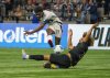Vancouver Whitecaps' Emmanuel Sabbi (top) kicks the ball past Inter Miami's Maximiliano Falcon during the second half of a CONCACAF Champions Cup semifinal soccer match, in Vancouver, on Thursday, April 24, 2025. THE CANADIAN PRESS/Christopher Morris