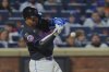 New York Mets' Mark Vientos hits a home run during the sixth inning of a baseball game against the St. Louis Cardinals Friday, April 18, 2025, in New York. (AP Photo/Frank Franklin II)