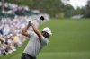 Scottie Scheffler hits his tee shot on the 14th hole during the first round at the Masters golf tournament, Thursday, April 10, 2025, in Augusta, Ga. (AP Photo/David J. Phillip)
