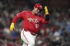 St. Louis Cardinals' Yohel Pozo rounds first on his way to an RBI double during the fifth inning of a baseball game against the Philadelphia Phillies Friday, April 11, 2025, in St. Louis. (AP Photo/Jeff Roberson)