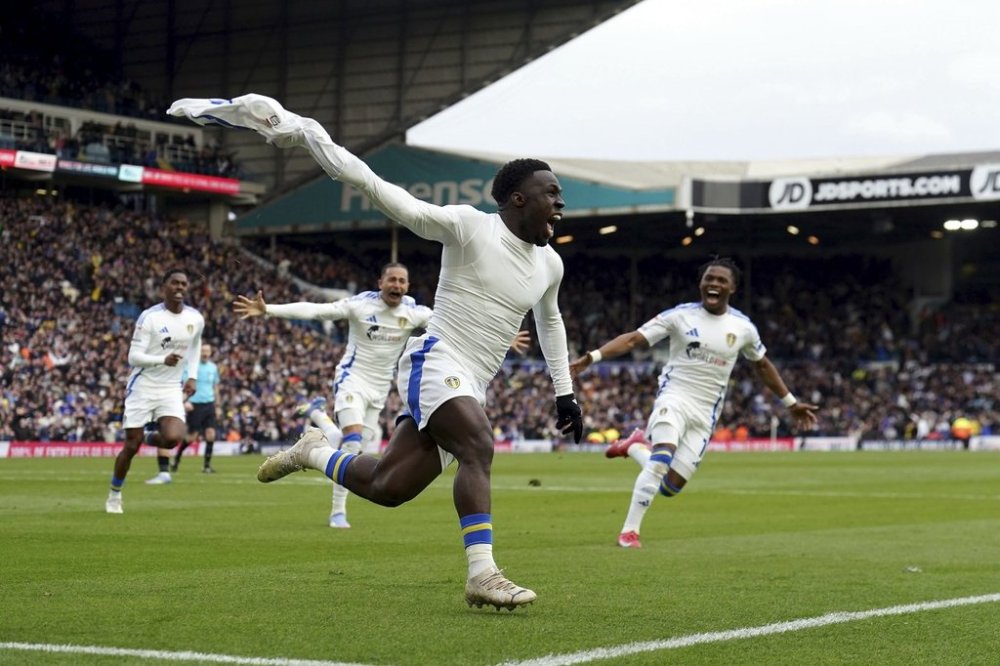 Leeds United's Wilfried Gnonto celebrates scoring their side's second goal of the game during a Sky Bet Championship soccer match against Swansea City, Saturday, March 29, 2025, at Elland Road in Leeds, England. (Martin Rickett/PA via AP)