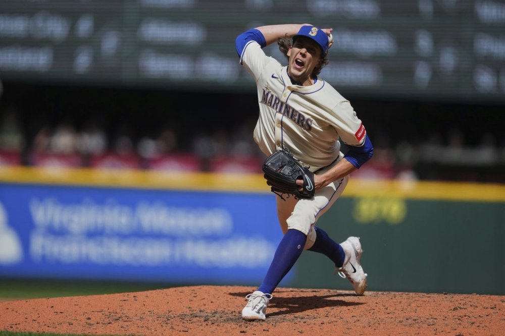 Seattle Mariners starting pitcher Logan Gilbert throws against the Texas Rangers during the fourth inning of a baseball game Sunday, April 13, 2025, in Seattle. (AP Photo/Lindsey Wasson)