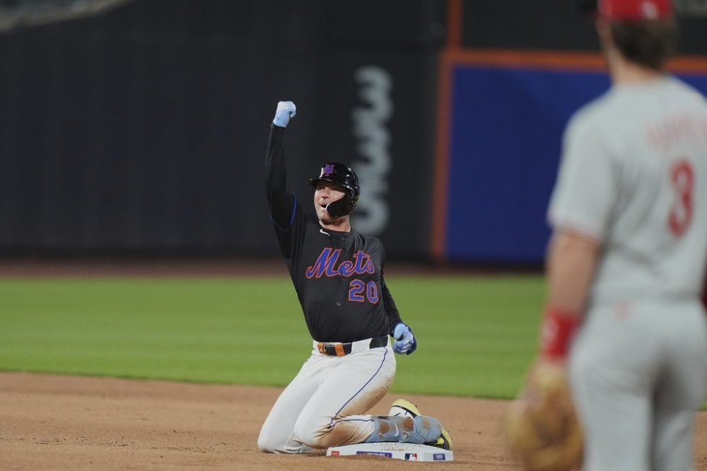 New York Mets' Pete Alonso celebrates after hitting an RBI double during the seventh inning of a baseball game against the Philadelphia Phillies Tuesday, April 22, 2025, in New York. (AP Photo/Frank Franklin II)