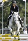 FILE - Philippines’ Mikaela Jaworski with horse Globe Platinum Leap of Faith clears an obstacle at a speed course during the equestrian individual qualifying event at 23rd South East Asian Games in suburban Alabang, south of Manila, Philippines on Thursday, Dec. 1, 2005. (AP Photo/Aaron Favila, File)