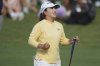Mao Saigo, of Japan, celebrates her win during a playoff round of the Chevron Championship LPGA golf tournament Sunday, April 27, 2025, in The Woodlands, Texas. (AP Photo/Eric Gay)