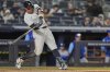 New York Yankees' Aaron Judge hits a home run during the seventh inning of a baseball game against the Kansas City Royals Wednesday, April 16, 2025, in New York. (AP Photo/Frank Franklin II)