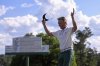 Bernhard Langer, of Germany, waves to the gallery after the second round at the Masters golf tournament, Friday, April 11, 2025, in Augusta, Ga. (AP Photo/George Walker IV)