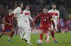 FILE - Turkey's Caglar Soyuncu, left, and Wales' Aaron Ramsey fight for the ball during the UEFA Nations League soccer match between Wales and Turkey, at the Cardiff City Stadium, Wales, Friday, Sept. 6, 2024. (AP Photo/Kin Cheung, File)