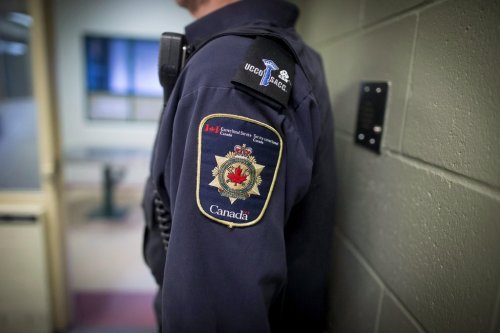 A shoulder patch and epaulette of a corrections officer are seen at an institution in Abbotsford, B.C., Oct. 26, 2017. THE CANADIAN PRESS/Darryl Dyck