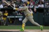 San Diego Padres' Jake Cronenworth watches his two-run home run during the first inning of a baseball game against the Athletics, Monday, April 7, 2025, in West Sacramento, Calif. (AP Photo/Godofredo A. Vásquez)