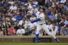 Chicago Cubs' Kyle Tucker (30) hits a single during the first inning of a baseball game against the Arizona Diamondbacks, Friday, April 18, 2025, in Chicago. (AP Photo/Erin Hooley)
