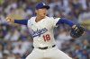 Los Angeles Dodgers starting pitcher Yoshinobu Yamamoto delivers during the first inning of a baseball game against the Chicago Cubs, Friday, April 11, 2025, in Los Angeles. (AP Photo/Jayne Kamin-Oncea)