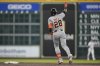 Detroit Tigers' Javier Baez runs the bases after hitting a grand slam during the third inning of a baseball game against the Houston Astros in Houston, Wednesday, April 30, 2025. Kerry Carpenter, Riley Greene, and Colt Keith scored. (AP Photo/Ashley Landis)
