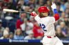 Philadelphia Phillies' Alec Bohm with the single to score Nick Castellanos during the sixth inning of a baseball game against the San Francisco Giants, Tuesday, April 15, 2025, in Philadelphia. (AP Photo/Chris Szagola)