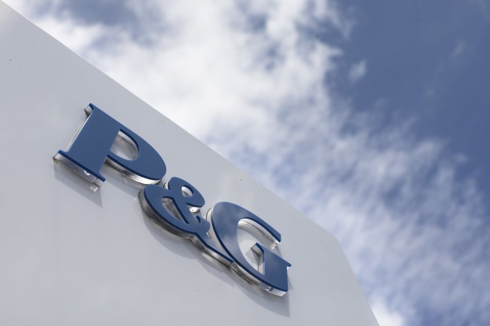 FILE - This July 9, 2015, file photo, shows signage outside Procter & Gamble corporate headquarters in downtown Cincinnati. (AP Photo/John Minchillo, File)