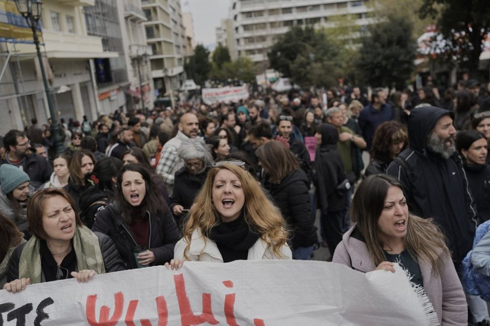 Protesters take part in rally during a nationwide 24-hour strike, as labor unions press for a full return of collective bargaining rights that were scrapped during successive international bailouts more than a decade ago, in central Athens, Greece, Wednesday, April 9, 2025. (AP Photo/Petros Giannakouris)