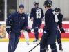 Winnipeg Jets head coach Scott Arniel takes to Josh Morrissey (44) during their NHL training camp practice in Winnipeg, Friday, September 20, 2024. THE CANADIAN PRESS/John Woods